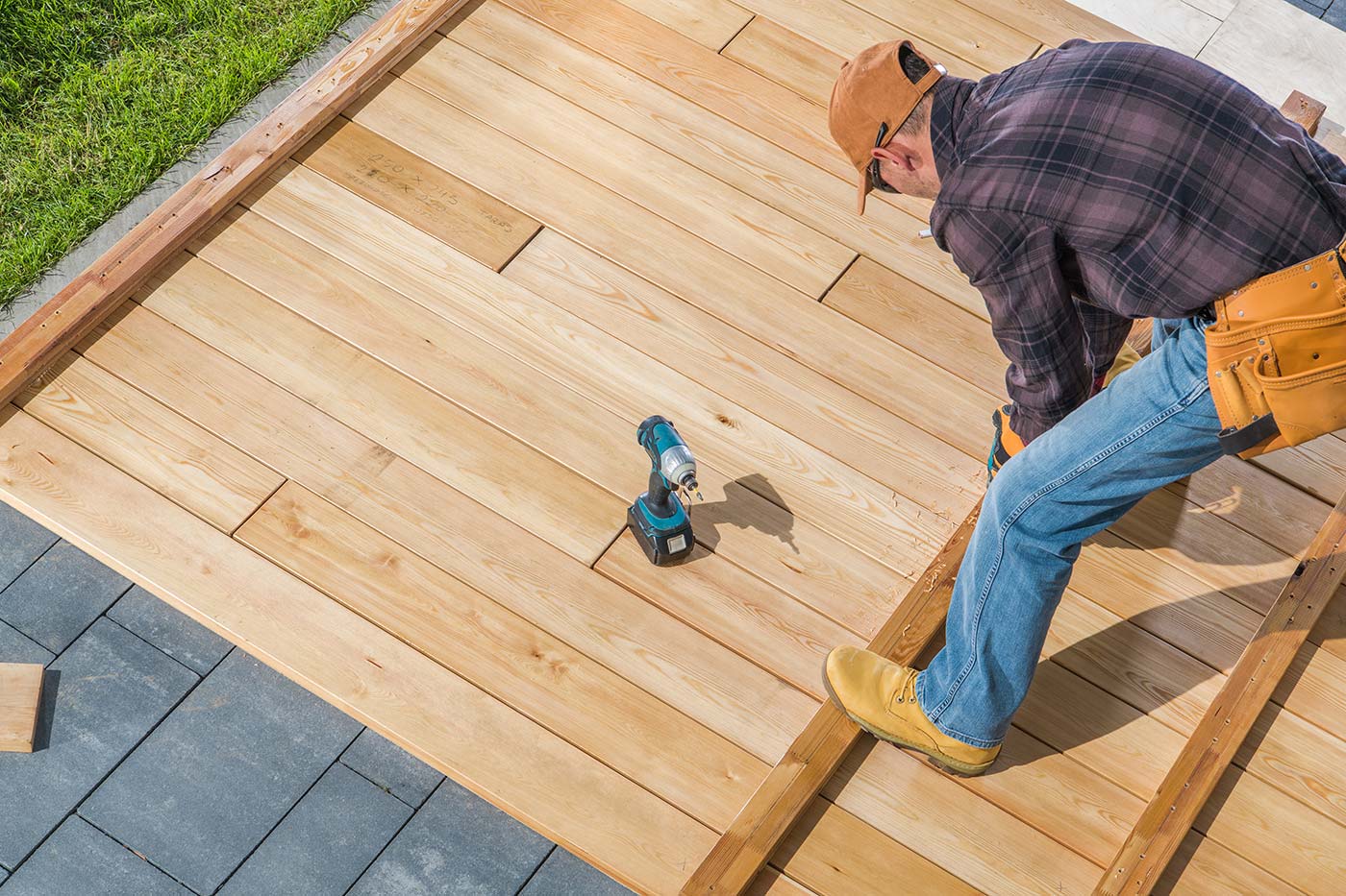 men-building-wooden-deck-on-his-backyard-2021-08-28-22-28-46-utc